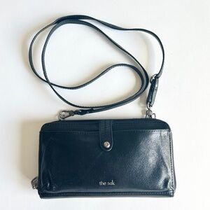 The Sak Black Genuine Leather Crossbody Zip Around Wallet